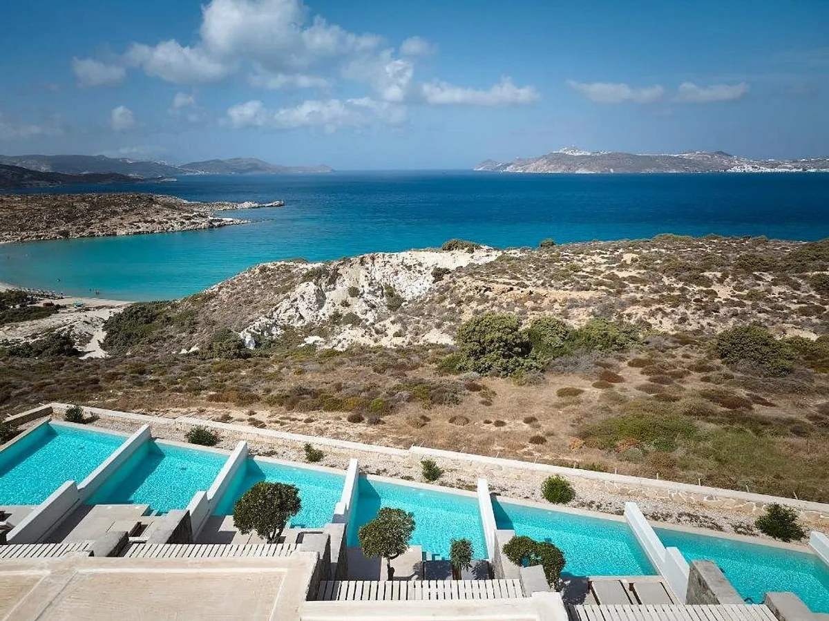 Boutique hotel pools overlooking the Aegean Sea, Greek islands